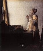 Woman with a Pearl Necklace Jan Vermeer